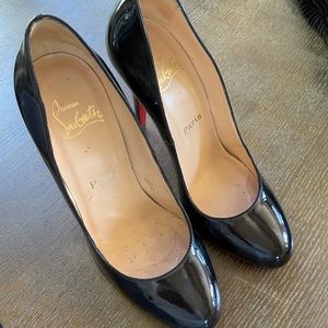 Louboutin patent dark blue heels. Great condition.